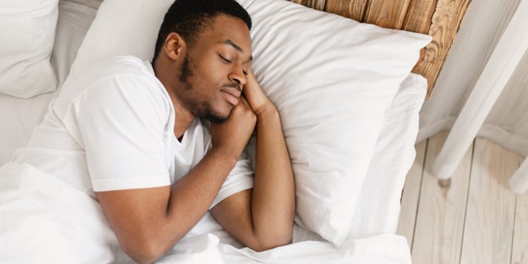 Silhouette of a man sleeping 